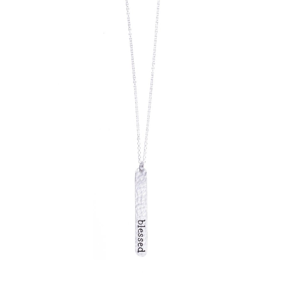 silver metal bar necklace with word "blessed" on it