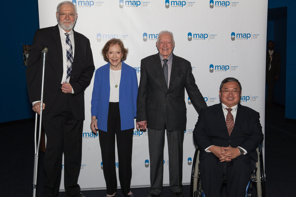 TOP: DR. BILL FOEGE, PRESIDENT JIMMY CARTER AND MRS. ROSALYNN CARTER, AND STEVE STIRLING AT THE 2018 GLOBAL HEALTH AWARDS BOTTOM: AMBASSADOR ANDREW J. YOUNG JR. AND DR. ROBERT REDFIELD, MD (ON BEHALF OF THE CDC) ACCEPTING THEIR AWARDS AT THE 2019 EVENT