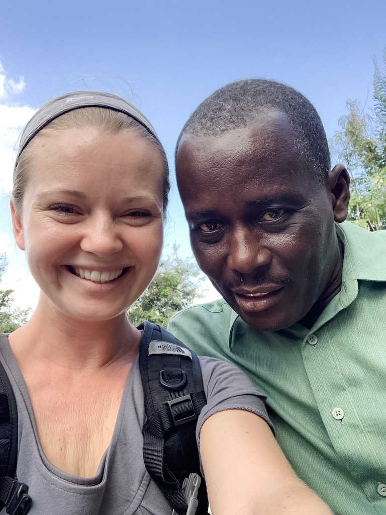 American and Haitian smiling together