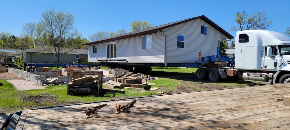 Lifting up the cabin structure so that it can be moved to another property and have a new "life"!