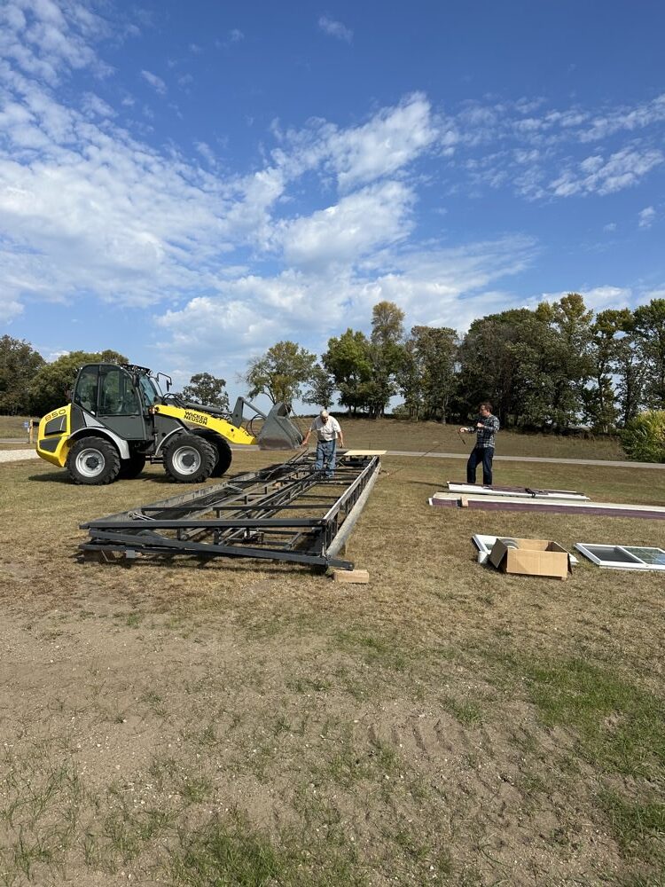 Removing and loading the big hanger door for a buyer from Idaho