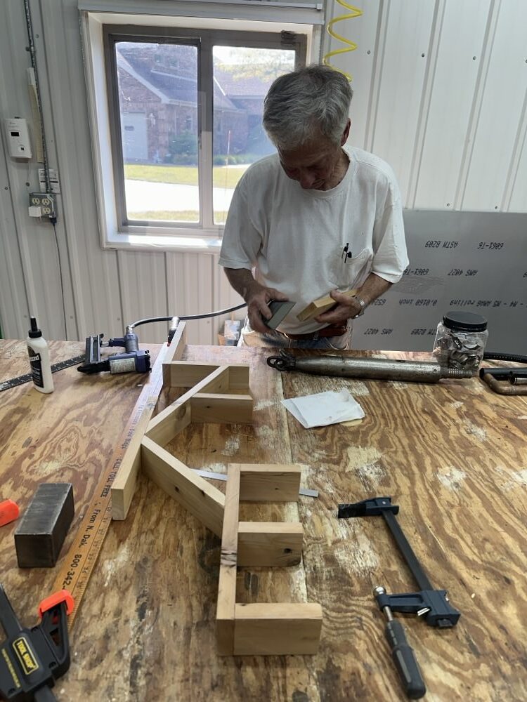My dad helped me make this wooden "lake" decor for the guest loft!